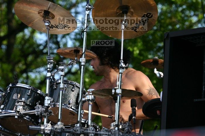 Trapt performs on the 99X stage on the second day of Music Midtown, 2004.
Filename: IMG_6439.jpg
Aperture: f/5.6
Shutter Speed: 1/320
Body: Canon EOS DIGITAL REBEL
Lens: Canon EF 80-200mm f/2.8 L