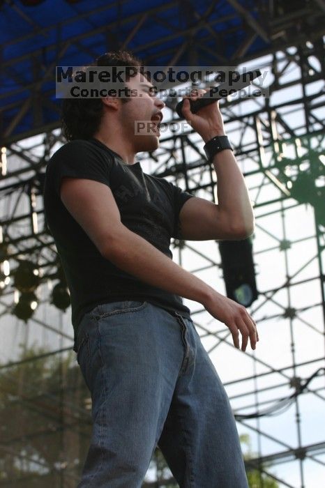 Trapt performs on the 99X stage on the second day of Music Midtown, 2004.

Filename: IMG_6424.jpg
Aperture: f/7.1
Shutter Speed: 1/320
Body: Canon EOS DIGITAL REBEL
Lens: Canon EF 80-200mm f/2.8 L