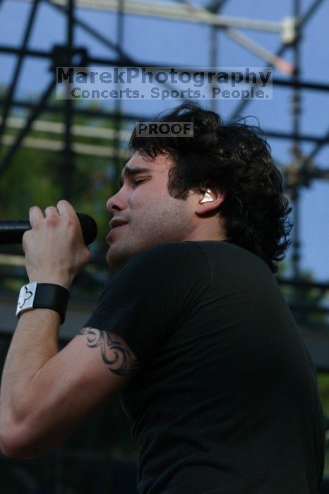 Trapt performs on the 99X stage on the second day of Music Midtown, 2004.
Filename: IMG_6560.jpg
Aperture: f/9.0
Shutter Speed: 1/320
Body: Canon EOS DIGITAL REBEL
Lens: Canon EF 80-200mm f/2.8 L