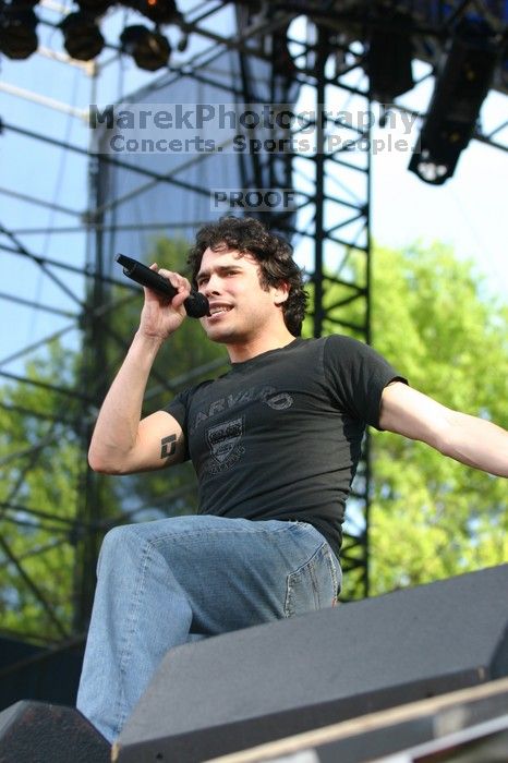 Trapt performs on the 99X stage on the second day of Music Midtown, 2004.
Filename: IMG_6451.jpg
Aperture: f/3.5
Shutter Speed: 1/320
Body: Canon EOS DIGITAL REBEL
Lens: Canon EF 80-200mm f/2.8 L