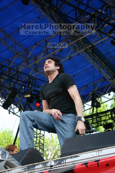 Trapt performs on the 99X stage on the second day of Music Midtown, 2004.
Filename: IMG_6507.jpg
Aperture: f/6.3
Shutter Speed: 1/125
Body: Canon EOS DIGITAL REBEL
Lens: Canon EF-S 18-55mm f/3.5-5.6