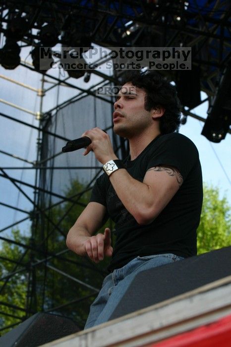 Trapt performs on the 99X stage on the second day of Music Midtown, 2004.

Filename: IMG_6551.jpg
Aperture: f/8.0
Shutter Speed: 1/320
Body: Canon EOS DIGITAL REBEL
Lens: Canon EF 80-200mm f/2.8 L