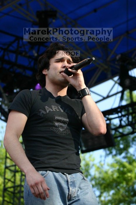 Trapt performs on the 99X stage on the second day of Music Midtown, 2004.
Filename: IMG_6447.jpg
Aperture: f/5.0
Shutter Speed: 1/320
Body: Canon EOS DIGITAL REBEL
Lens: Canon EF 80-200mm f/2.8 L