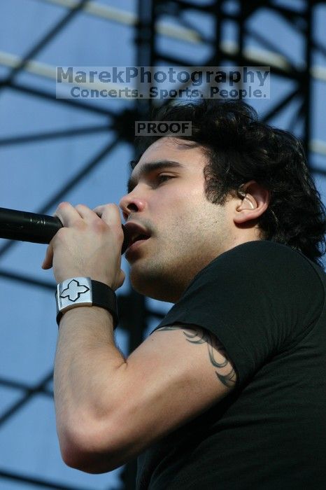 Trapt performs on the 99X stage on the second day of Music Midtown, 2004.
Filename: IMG_6522.jpg
Aperture: f/9.0
Shutter Speed: 1/320
Body: Canon EOS DIGITAL REBEL
Lens: Canon EF 80-200mm f/2.8 L