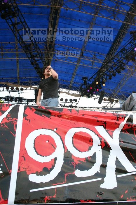 Trapt performs on the 99X stage on the second day of Music Midtown, 2004.
Filename: IMG_6490.jpg
Aperture: f/5.6
Shutter Speed: 1/125
Body: Canon EOS DIGITAL REBEL
Lens: Canon EF-S 18-55mm f/3.5-5.6