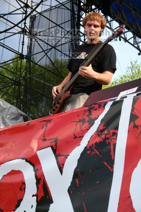 Trapt performs on the 99X stage on the second day of Music Midtown, 2004.
Filename: IMG_6489.jpg
Aperture: f/9.0
Shutter Speed: 1/125
Body: Canon EOS DIGITAL REBEL
Lens: Canon EF-S 18-55mm f/3.5-5.6