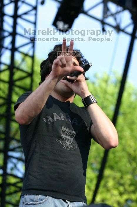 Trapt performs on the 99X stage on the second day of Music Midtown, 2004.
Filename: IMG_6446.jpg
Aperture: f/5.0
Shutter Speed: 1/320
Body: Canon EOS DIGITAL REBEL
Lens: Canon EF 80-200mm f/2.8 L