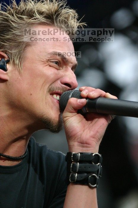 Fuel performs on the 99X stage on the third day of Music Midtown, 2004.
Filename: IMG_7189.jpg
Aperture: f/4.0
Shutter Speed: 1/320
Body: Canon EOS DIGITAL REBEL
Lens: Canon EF 80-200mm f/2.8 L