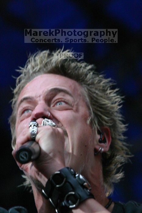 Fuel performs on the 99X stage on the third day of Music Midtown, 2004.
Filename: IMG_7215.jpg
Aperture: f/5.6
Shutter Speed: 1/320
Body: Canon EOS DIGITAL REBEL
Lens: Canon EF 80-200mm f/2.8 L