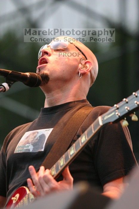 Fuel performs on the 99X stage on the third day of Music Midtown, 2004.
Filename: IMG_7194.jpg
Aperture: f/3.5
Shutter Speed: 1/320
Body: Canon EOS DIGITAL REBEL
Lens: Canon EF 80-200mm f/2.8 L