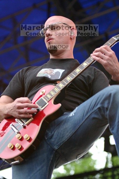 Fuel performs on the 99X stage on the third day of Music Midtown, 2004.
Filename: IMG_7201.jpg
Aperture: f/2.8
Shutter Speed: 1/320
Body: Canon EOS DIGITAL REBEL
Lens: Canon EF 80-200mm f/2.8 L