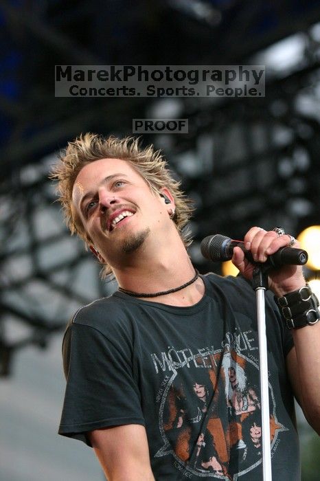 Fuel performs on the 99X stage on the third day of Music Midtown, 2004.

Filename: IMG_7178.jpg
Aperture: f/3.5
Shutter Speed: 1/320
Body: Canon EOS DIGITAL REBEL
Lens: Canon EF 80-200mm f/2.8 L