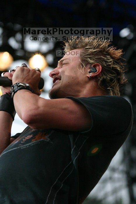 Fuel performs on the 99X stage on the third day of Music Midtown, 2004.
Filename: IMG_7169.jpg
Aperture: f/5.0
Shutter Speed: 1/320
Body: Canon EOS DIGITAL REBEL
Lens: Canon EF 80-200mm f/2.8 L