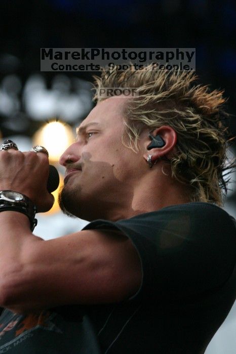 Fuel performs on the 99X stage on the third day of Music Midtown, 2004.

Filename: IMG_7167.jpg
Aperture: f/5.0
Shutter Speed: 1/320
Body: Canon EOS DIGITAL REBEL
Lens: Canon EF 80-200mm f/2.8 L