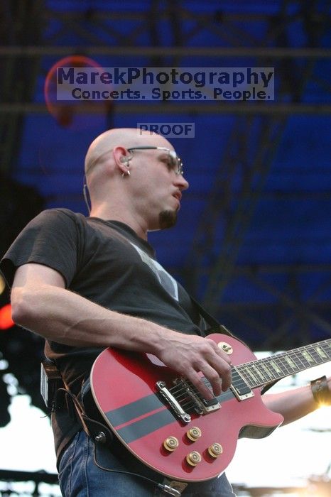 Fuel performs on the 99X stage on the third day of Music Midtown, 2004.
Filename: IMG_7184.jpg
Aperture: f/3.5
Shutter Speed: 1/320
Body: Canon EOS DIGITAL REBEL
Lens: Canon EF 80-200mm f/2.8 L