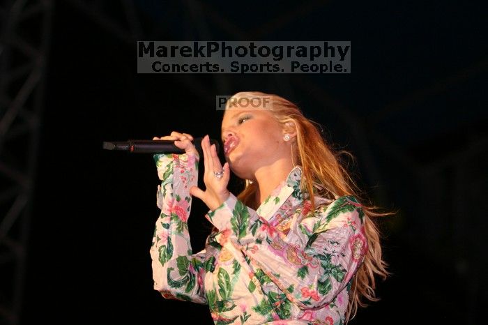 Jessica Simpson performs on the third day of Music Midtown, 2004.

Filename: IMG_7290.jpg
Aperture: f/2.8
Shutter Speed: 1/250
Body: Canon EOS DIGITAL REBEL
Lens: Canon EF 80-200mm f/2.8 L