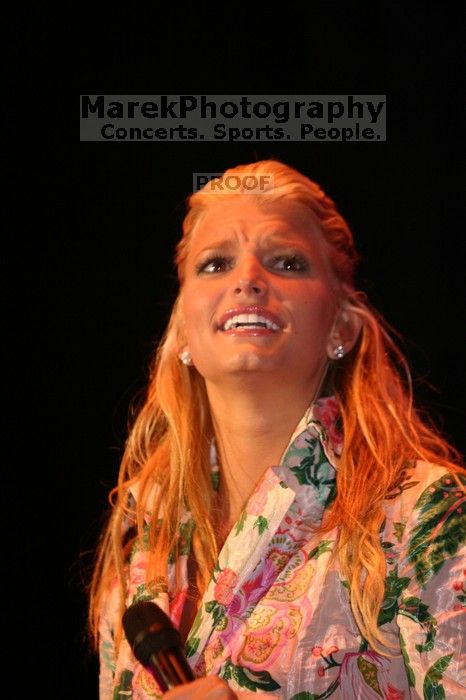 Jessica Simpson performs on the third day of Music Midtown, 2004.

Filename: IMG_7268.jpg
Aperture: f/2.8
Shutter Speed: 1/250
Body: Canon EOS DIGITAL REBEL
Lens: Canon EF 80-200mm f/2.8 L