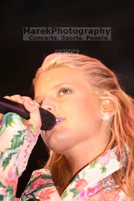 Jessica Simpson performs on the third day of Music Midtown, 2004.

Filename: IMG_7361.jpg
Aperture: f/2.8
Shutter Speed: 1/250
Body: Canon EOS DIGITAL REBEL
Lens: Canon EF 80-200mm f/2.8 L