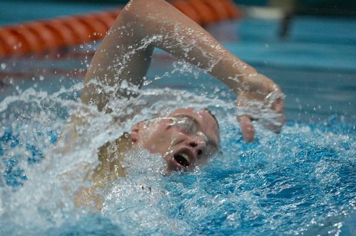 Blake Copple of the University of Texas Men's Varsity Swim Team placed 2nd in the 3rd heat of the 1650 Freestyle Prelims with a time of 15:57.48 at the Speedo American Short Course Championships.
Filename: SRM_20060304_114448_9.jpg
Aperture: f/2.8
Shutter Speed: 1/800
Body: Canon EOS 20D
Lens: Canon EF 80-200mm f/2.8 L