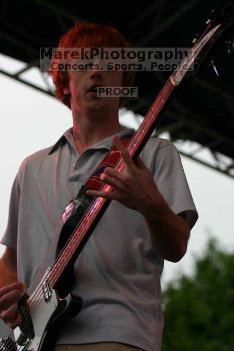 The Whigs perform on the third day of Music Midtown, 2004.

Filename: IMG_7039.jpg
Aperture: f/3.5
Shutter Speed: 1/250
Body: Canon EOS DIGITAL REBEL
Lens: Canon EF 80-200mm f/2.8 L