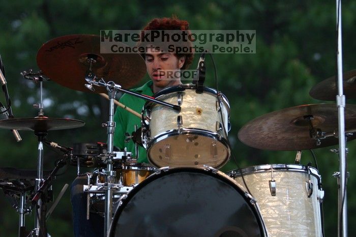 The Whigs perform on the third day of Music Midtown, 2004.

Filename: IMG_7072.jpg
Aperture: f/3.2
Shutter Speed: 1/250
Body: Canon EOS DIGITAL REBEL
Lens: Canon EF 80-200mm f/2.8 L