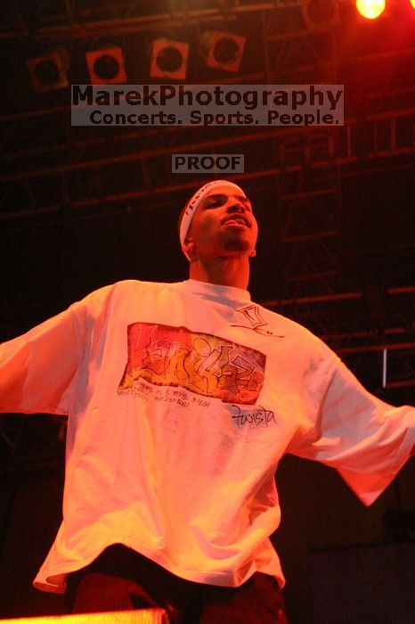 Twista performs on the third day of Music Midtown, 2004.

Filename: IMG_7379.jpg
Aperture: f/7.1
Shutter Speed: 1/80
Body: Canon EOS DIGITAL REBEL
Lens: Canon EF 50mm f/1.8 II