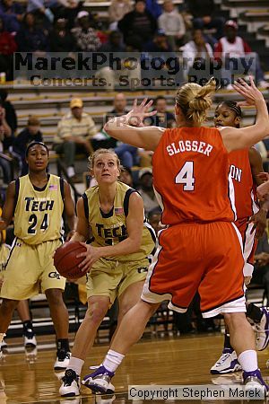 The Georgia Tech women's basketball team played Clemson.

Filename: img_0725_std.jpg
Aperture: f/2.8
Shutter Speed: 1/320
Body: Canon EOS DIGITAL REBEL
Lens: Canon EF 80-200mm f/2.8 L