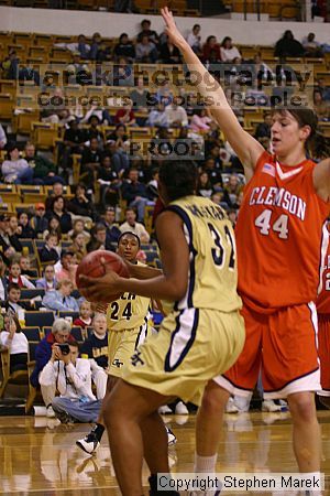 The Georgia Tech women's basketball team played Clemson.

Filename: img_0588_std.jpg
Aperture: f/2.8
Shutter Speed: 1/320
Body: Canon EOS DIGITAL REBEL
Lens: Canon EF 80-200mm f/2.8 L