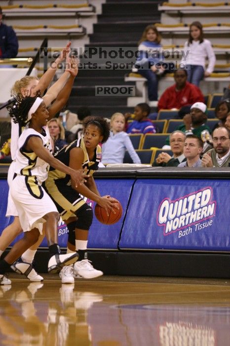 The Georgia Tech women's basketball team played Wake Forest.

Filename: IMG_1079.jpg
Aperture: f/2.8
Shutter Speed: 1/250
Body: Canon EOS DIGITAL REBEL
Lens: Canon EF 80-200mm f/2.8 L