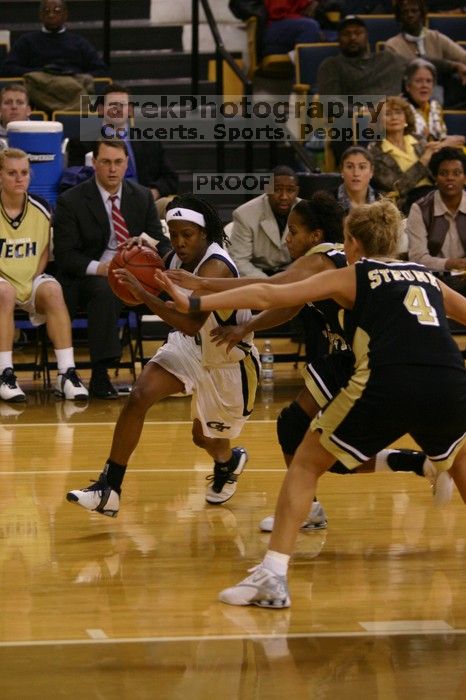 The Georgia Tech women's basketball team played Wake Forest.

Filename: IMG_1155.jpg
Aperture: f/2.8
Shutter Speed: 1/320
Body: Canon EOS DIGITAL REBEL
Lens: Canon EF 80-200mm f/2.8 L