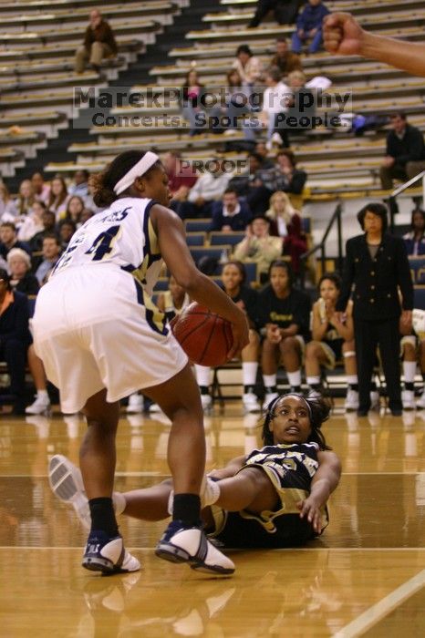 The Georgia Tech women's basketball team played Wake Forest.

Filename: IMG_1082.jpg
Aperture: f/2.8
Shutter Speed: 1/250
Body: Canon EOS DIGITAL REBEL
Lens: Canon EF 80-200mm f/2.8 L