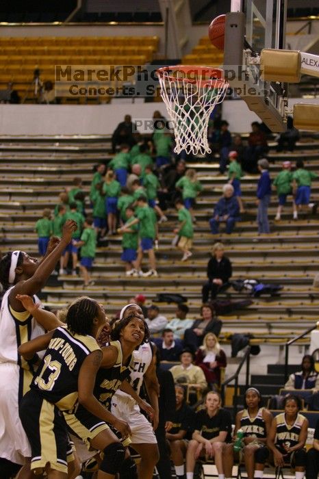 The Georgia Tech women's basketball team played Wake Forest.

Filename: IMG_1040.jpg
Aperture: f/2.8
Shutter Speed: 1/320
Body: Canon EOS DIGITAL REBEL
Lens: Canon EF 80-200mm f/2.8 L