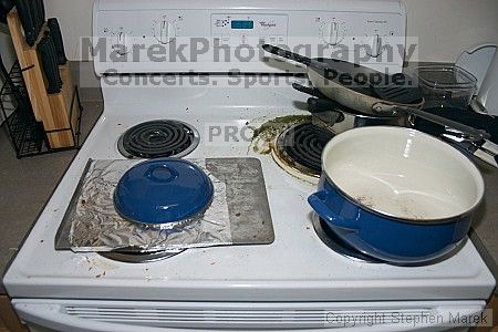 This is how the kitchen has been since 10/22/04.  Yes it is all Louie's.  Note the nearly empty dishwasher.

Filename: crw_3064_std.jpg
Aperture: f/3.5
Shutter Speed: 1/200
Body: Canon EOS DIGITAL REBEL
Lens: Canon EF-S 18-55mm f/3.5-5.6