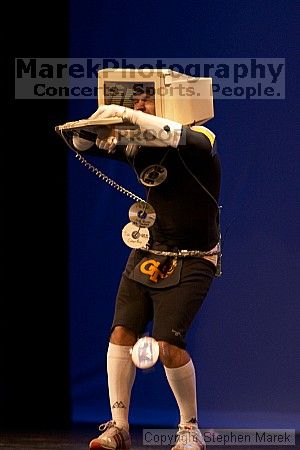 The superhero contest, which took place earlier in the day, was brought on stage in between acts at the Mock Rock competition at the Ferst Center.

Filename: crw_1635_std.jpg
Aperture: f/2.8
Shutter Speed: 1/60
Body: Canon EOS DIGITAL REBEL
Lens: Canon EF 80-200mm f/2.8 L