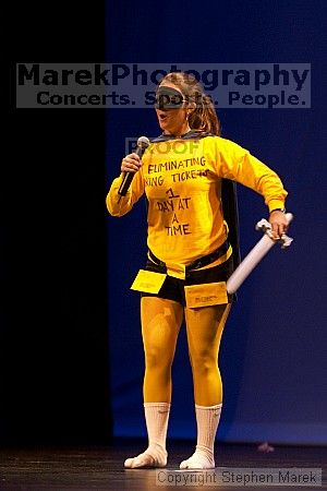 The superhero contest, which took place earlier in the day, was brought on stage in between acts at the Mock Rock competition at the Ferst Center.

Filename: crw_1639_std.jpg
Aperture: f/3.2
Shutter Speed: 1/60
Body: Canon EOS DIGITAL REBEL
Lens: Canon EF 80-200mm f/2.8 L