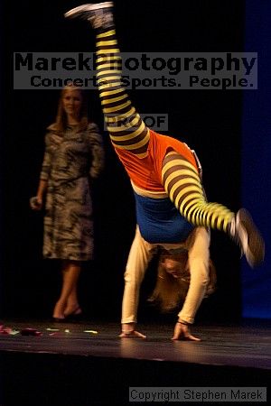 The superhero contest, which took place earlier in the day, was brought on stage in between acts at the Mock Rock competition at the Ferst Center.
Filename: crw_1650_std.jpg
Aperture: f/4.0
Shutter Speed: 1/100
Body: Canon EOS DIGITAL REBEL
Lens: Canon EF 80-200mm f/2.8 L