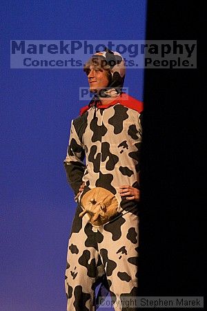 The cow placed 3rd in the superhero contest. The superhero contest, which took place earlier in the day, was brought on stage in between acts at the Mock Rock competition at the Ferst Center.
Filename: crw_1657_std.jpg
Aperture: f/3.5
Shutter Speed: 1/100
Body: Canon EOS DIGITAL REBEL
Lens: Canon EF 80-200mm f/2.8 L