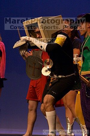 Second place in the super hero contest.  The superhero contest, which took place earlier in the day, was brought on stage in between acts at the Mock Rock competition at the Ferst Center.

Filename: crw_1658_std.jpg
Aperture: f/4.5
Shutter Speed: 1/100
Body: Canon EOS DIGITAL REBEL
Lens: Canon EF 80-200mm f/2.8 L