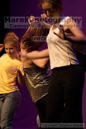 Dance contest in between acts at the Mock Rock competition at the Ferst Center.

Filename: crw_1663_std.jpg
Aperture: f/2.8
Shutter Speed: 1/160
Body: Canon EOS DIGITAL REBEL
Lens: Canon EF 80-200mm f/2.8 L