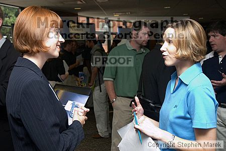 Courtney Wolfe speaks with a recruiter at the career fair.

Filename: crw_0769_std.jpg
Aperture: f/5.0
Shutter Speed: 1/60
Body: Canon EOS DIGITAL REBEL
Lens: Canon EF-S 18-55mm f/3.5-5.6