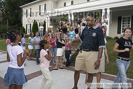 Coach Paul Hewitt and family leave AXO Thursday night after cooking out. AXO was the winning sorority for the basketball attendance competition.
Filename: crw_0094_std.jpg
Aperture: f/6.3
Shutter Speed: 1/80
Body: Canon EOS DIGITAL REBEL
Lens: Sigma 15-30mm f/3.5-4.5 EX Aspherical DG DF