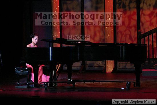 Miss Asian Atlanta pageant, 2004.

Filename: img_0849_std.jpg
Aperture: f/2.8
Shutter Speed: 1/160
Body: Canon EOS DIGITAL REBEL
Lens: Canon EF 80-200mm f/2.8 L